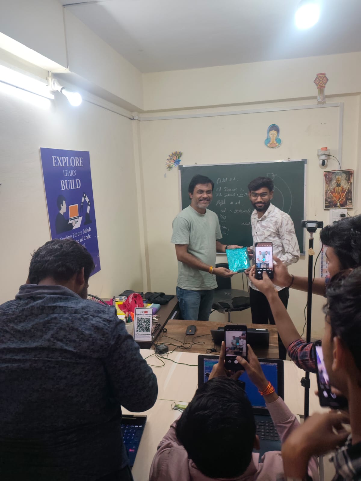 Student felicitation ceremony with mentor at training institute
